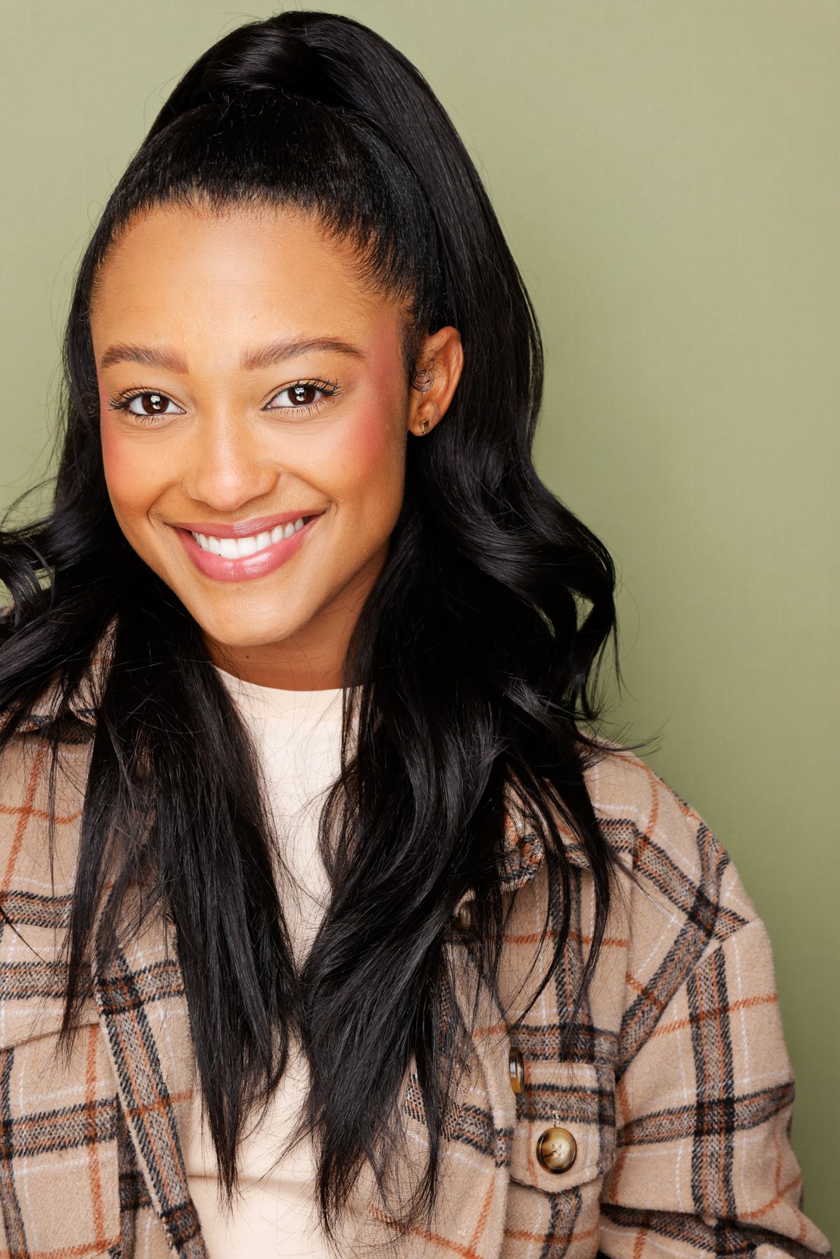 Plaid jacket, smiling
